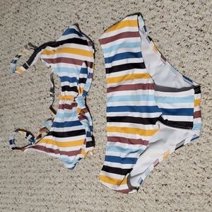 Never been worn, 2 piece swimming suit, size M